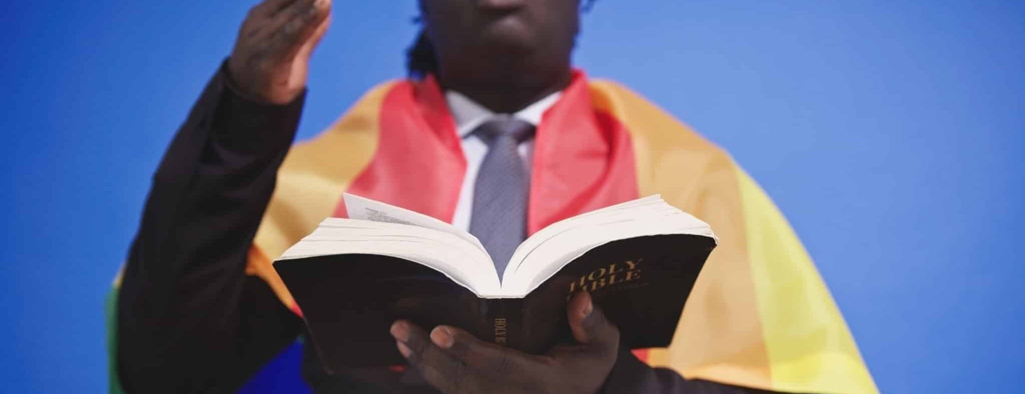 pro-LGBT man reading the Bible