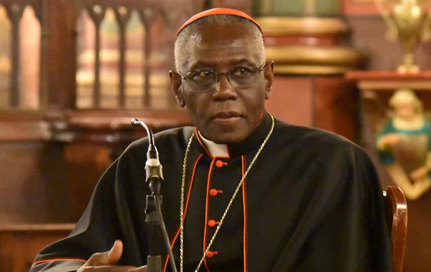 "<a href="https://commons.wikimedia.org/wiki/File:Cardinal_Robert_Sarah.JPG" target="_blank" rel="noopener">Le Cardinal Robert Sarah</a>" by François-Régis Salefran is licensed under the <a href="https://creativecommons.org/licenses/by-sa/4.0/deed.en" target="_blank" rel="noopener">Creative Commons Attribution-Share Alike 4.0 International license</a>. Cropped from original.