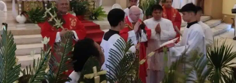 HLI President Fr. Boquet blessing palms for Palm Sunday in the Philippines.