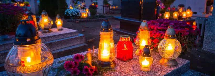 Colorful candles on the cemetery at All Saints Day, Poland